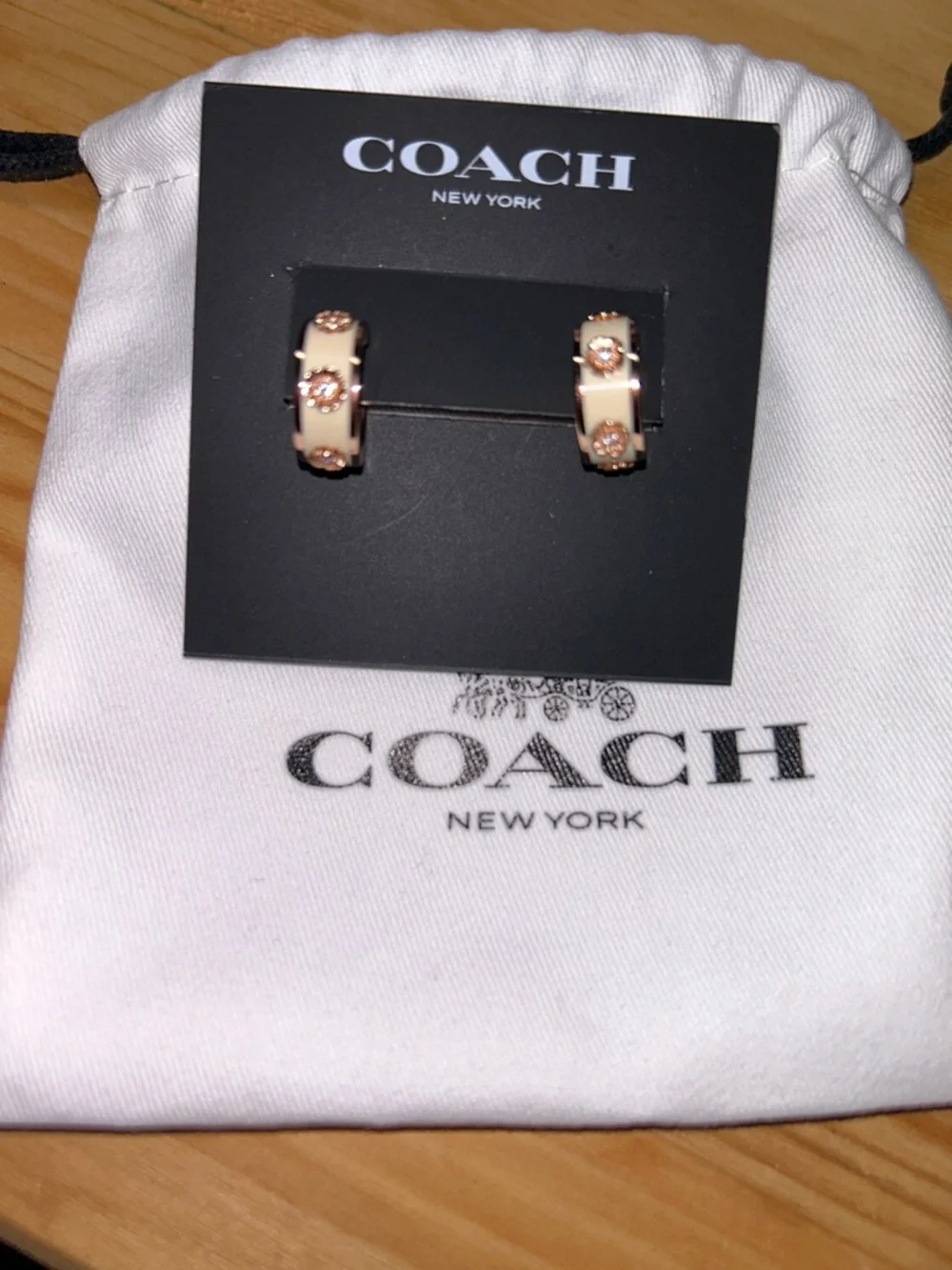 Coach Signature Tea Rose Enamel Huggie Hoop Earrings neutral chalk rose goldNWT - Picture 2 of 5